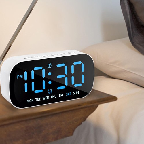 Digital alarm clock with - alarm,